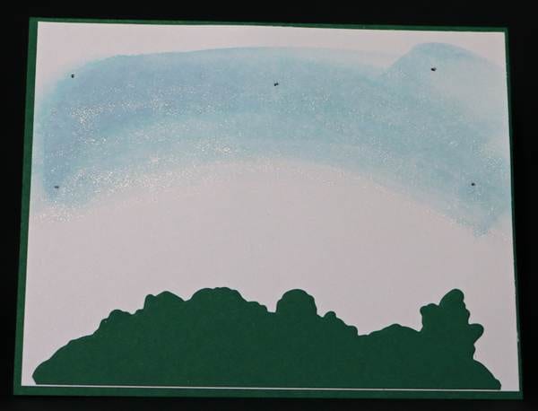 Close up of the marks that are used to add the Balmy Blue Ink & the Wink of Stella Clear Glitter. It also features Large Hill