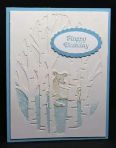 Make two cards from one design like this charming winter card with birch trees and a deer.